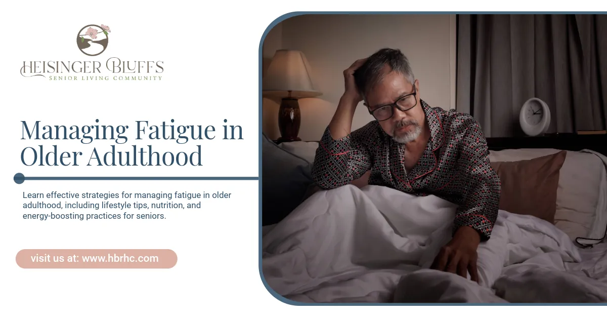 An elderly man sitting in bed, looking tired. 