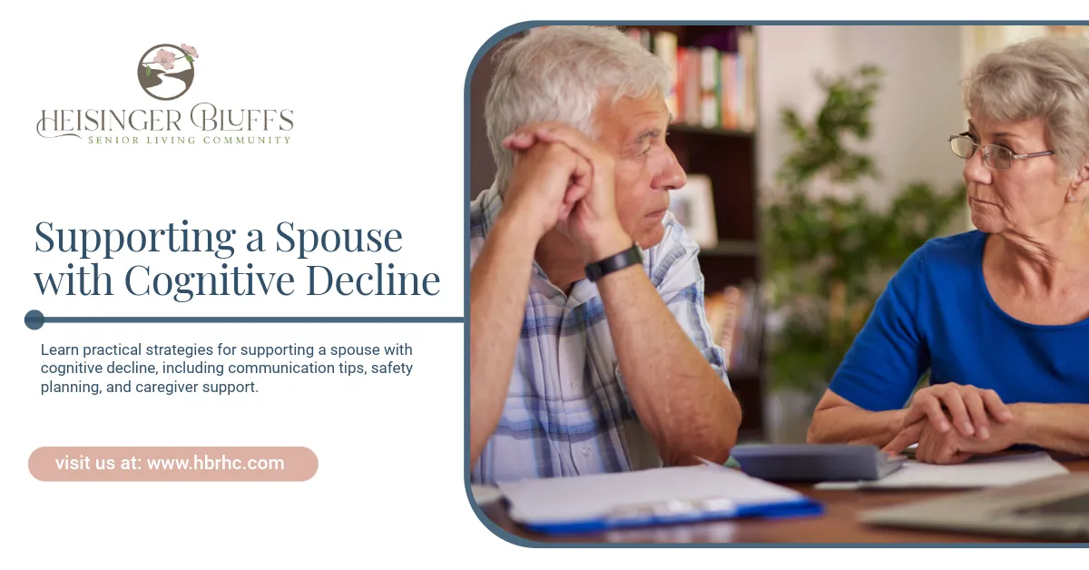 An elderly couple sitting beside each other looking at documents