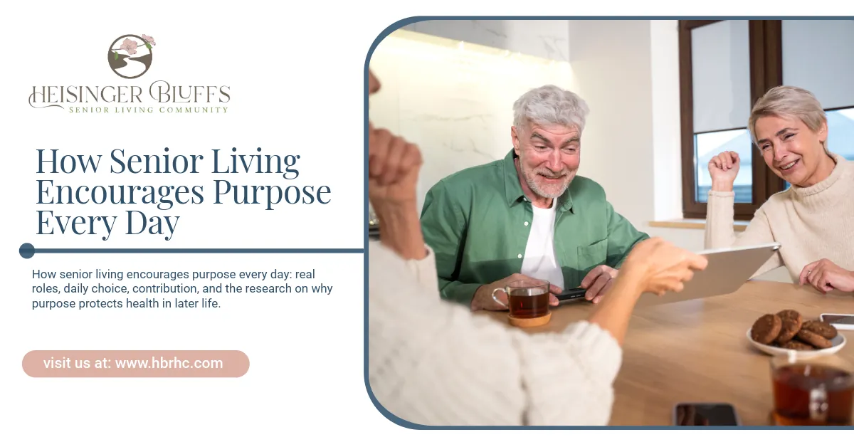 A group of seniors bonding over an iPad in a senior living community