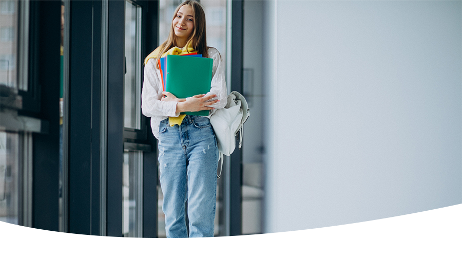 Columbia College student with books