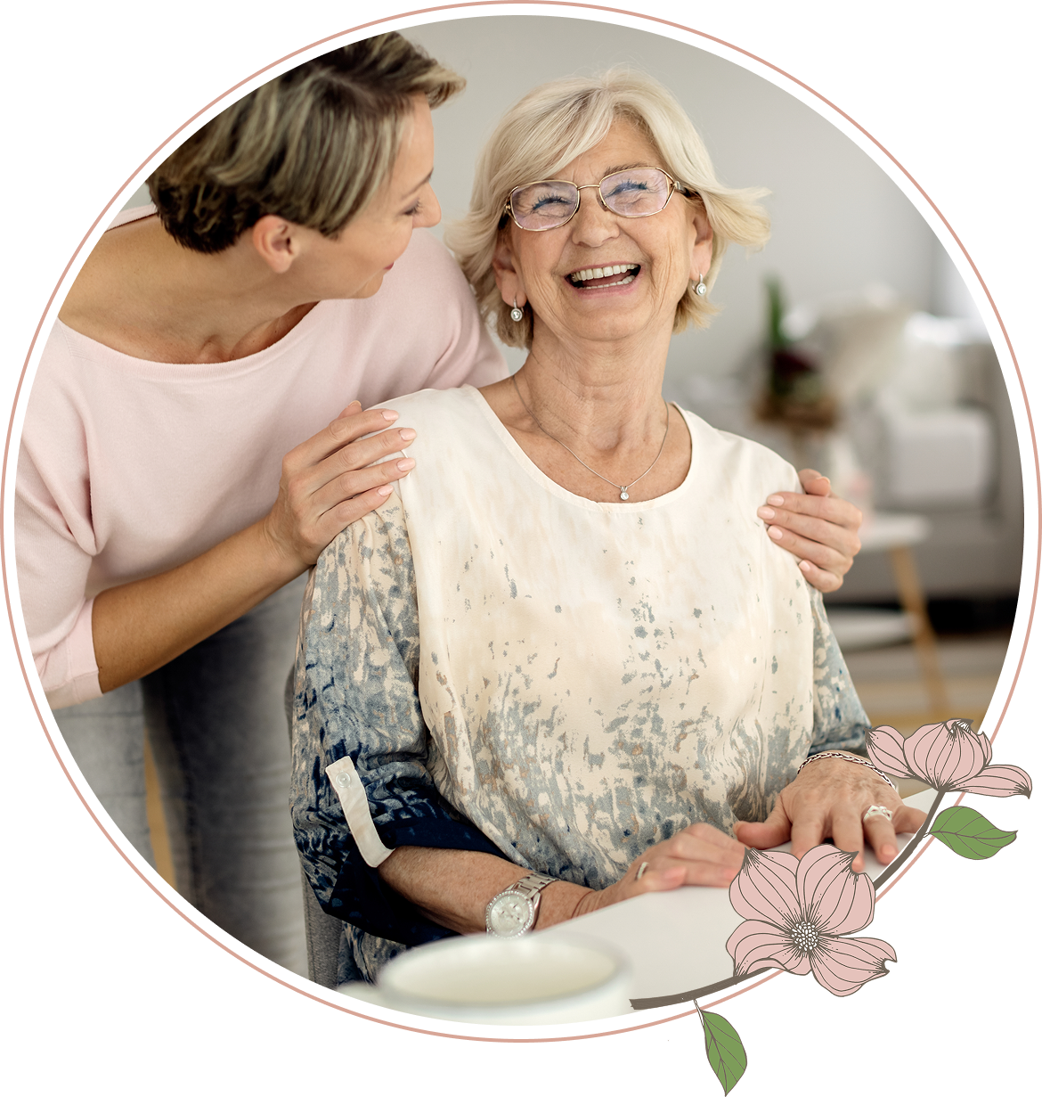 A senior woman smiling with a caregiver