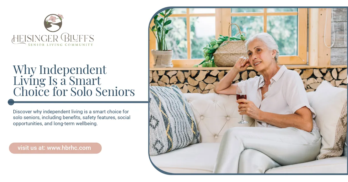 An elderly woman sitting on a sofa in an assisted living setting