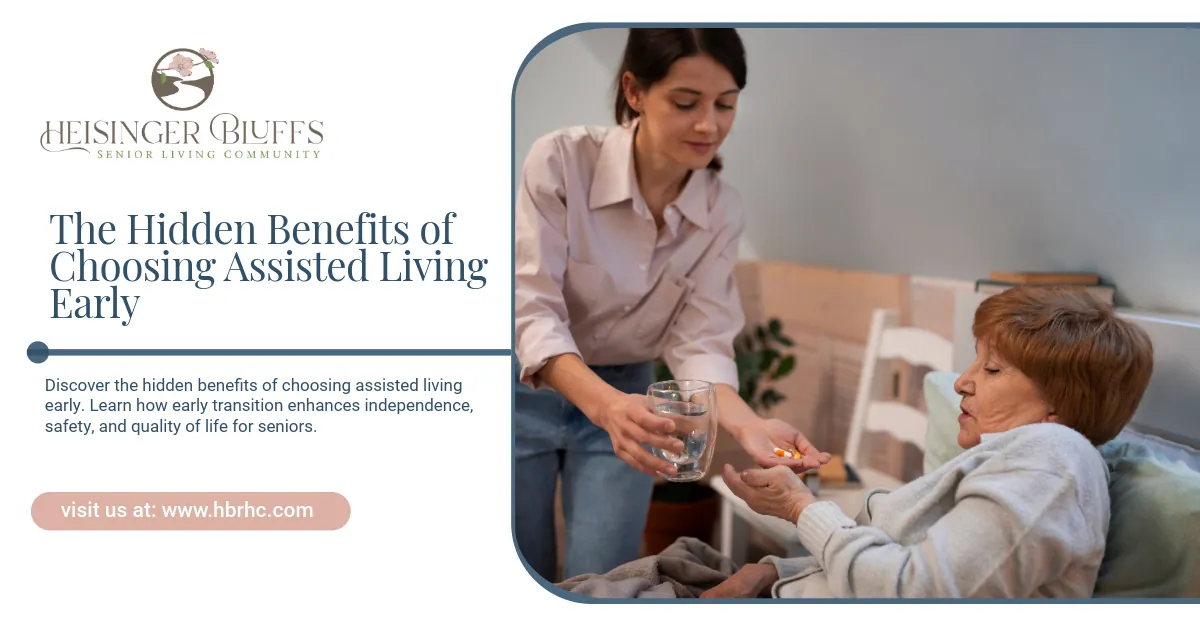 A caregiver is assisting an assisted living senior in bed with medication.