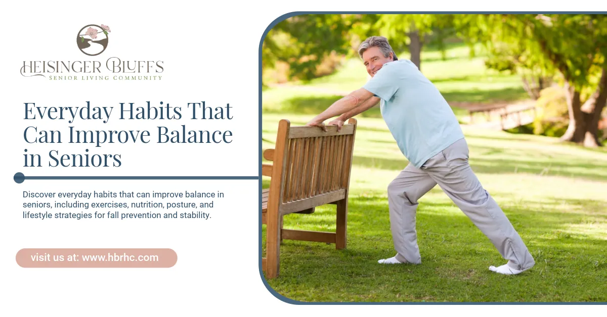 An elderly man is stretching in a park, leaning on a wooden bench.