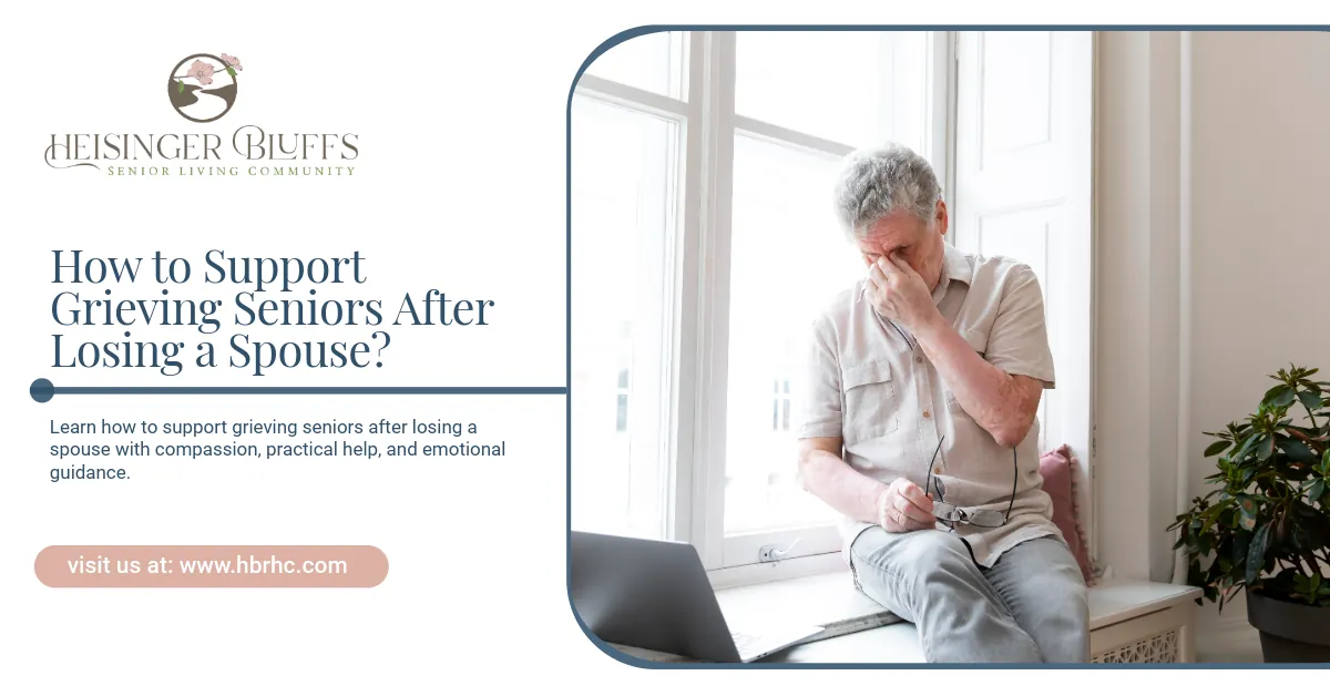 Elderly man grieving, sitting by window, covering face. 