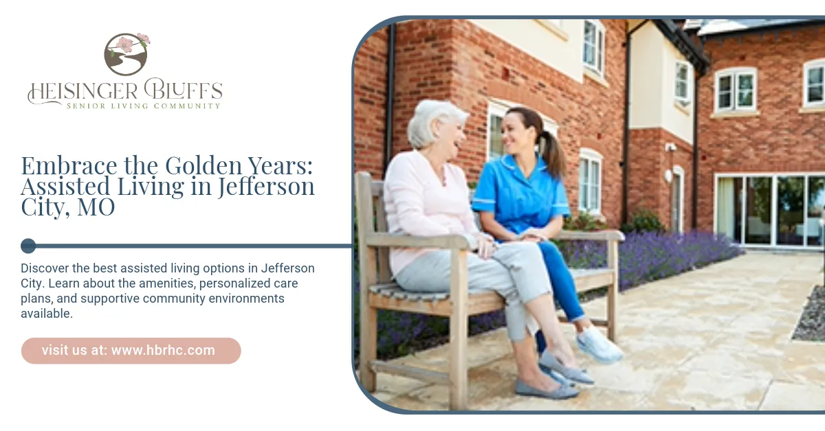 A nurse is sitting next to an older woman looking at a tablet.