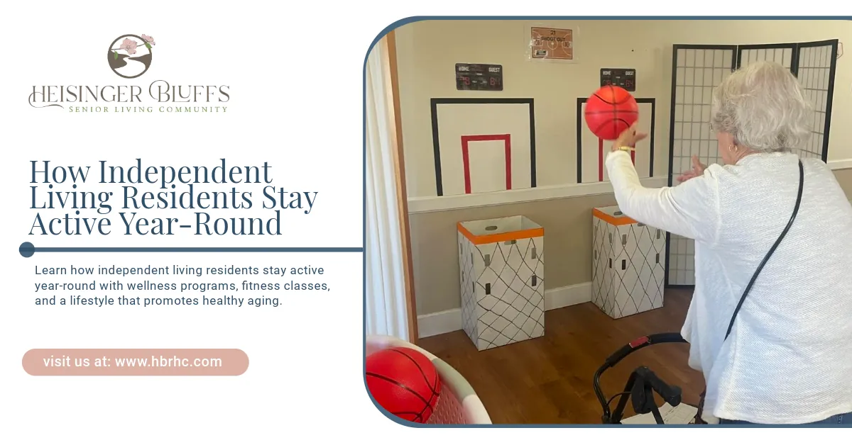 An elderly woman is playing basketball in a living room of an independent living facility.