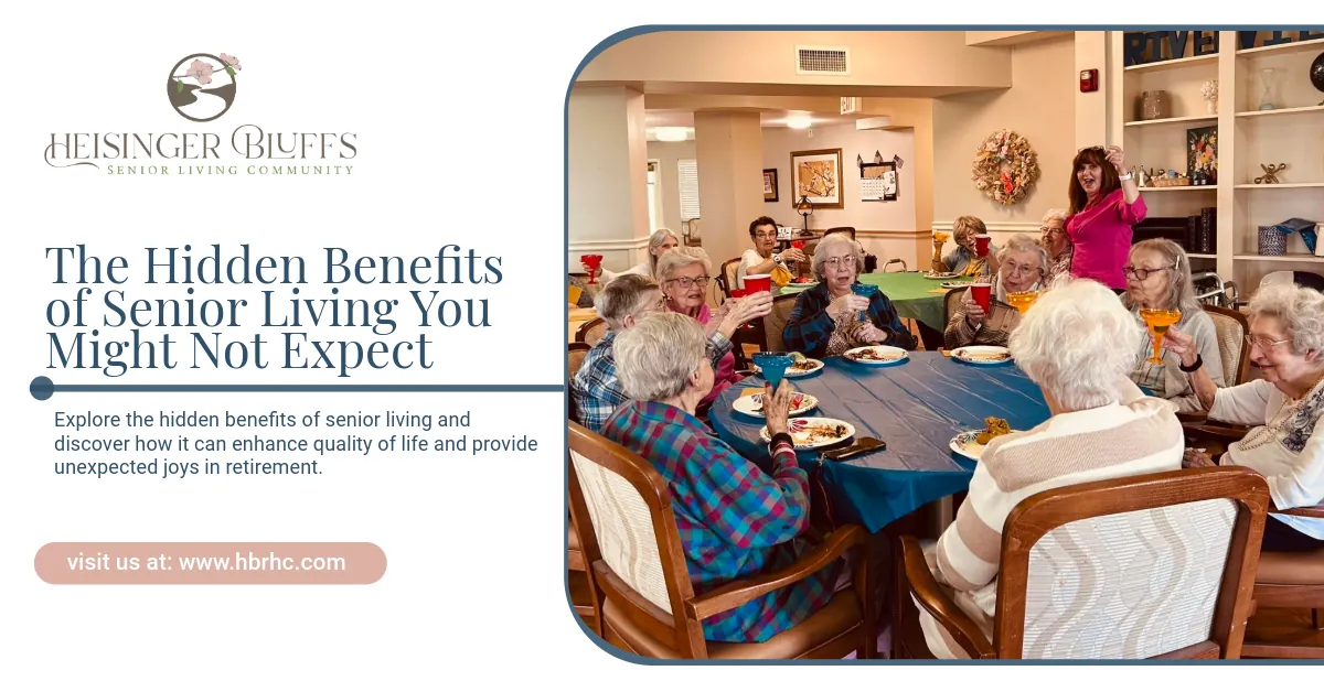 A group of elderly people is sitting around a table eating food in a senior living community.
